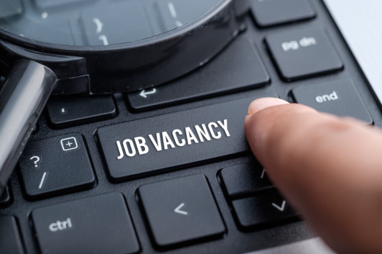 A keyboard with a Job Vacancy key
